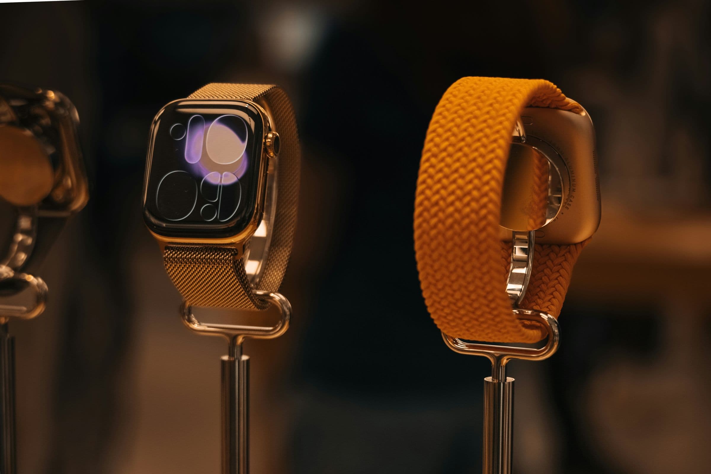 Smartwatches displayed on stands