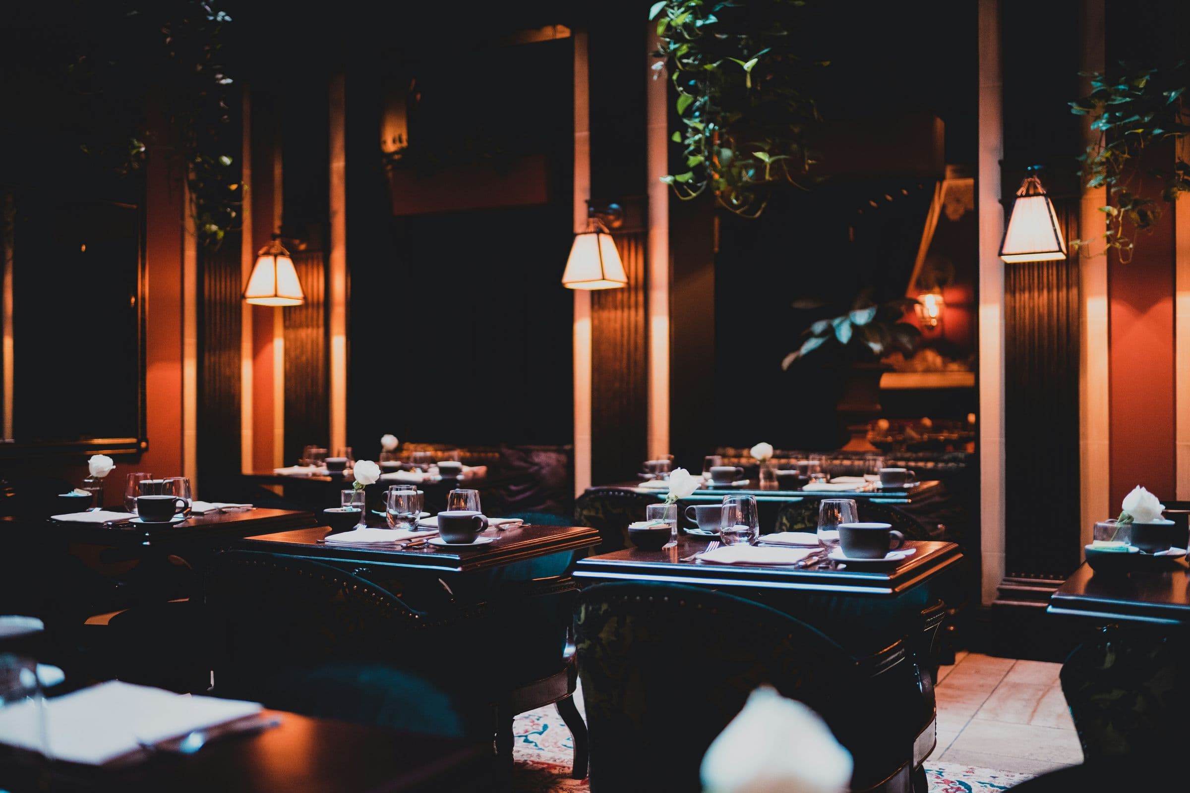 Candlelit restaurant with pendant lamps