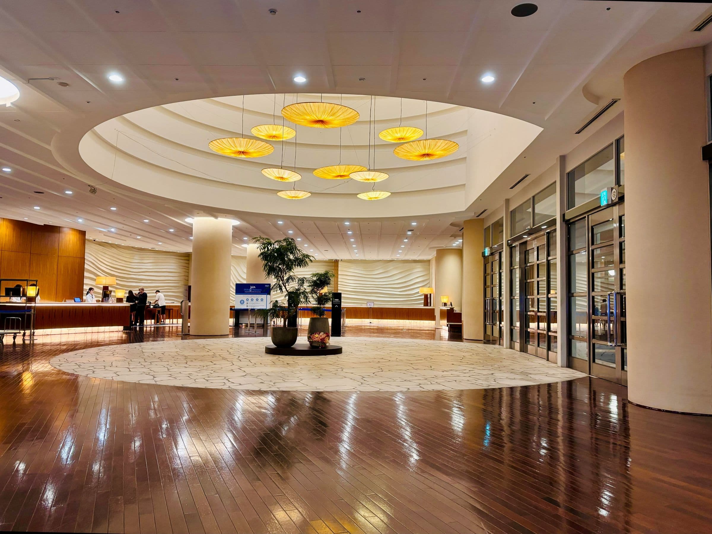 Bright rotunda lobby with a reception desk