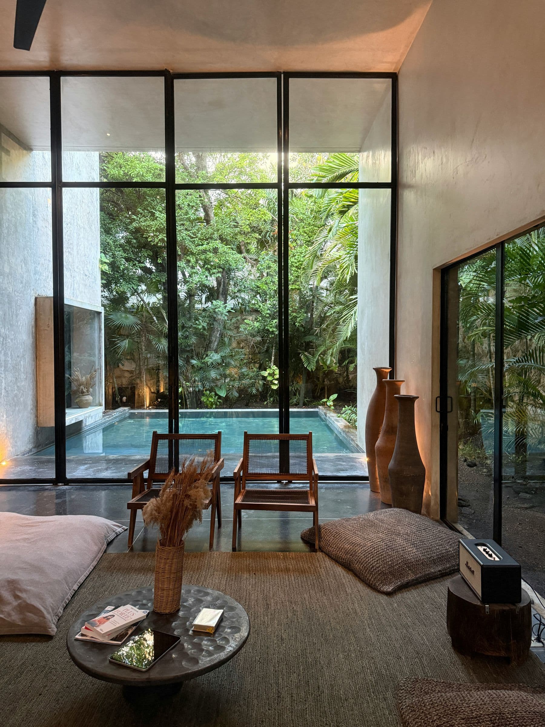 Villa living room looking out to a private pool